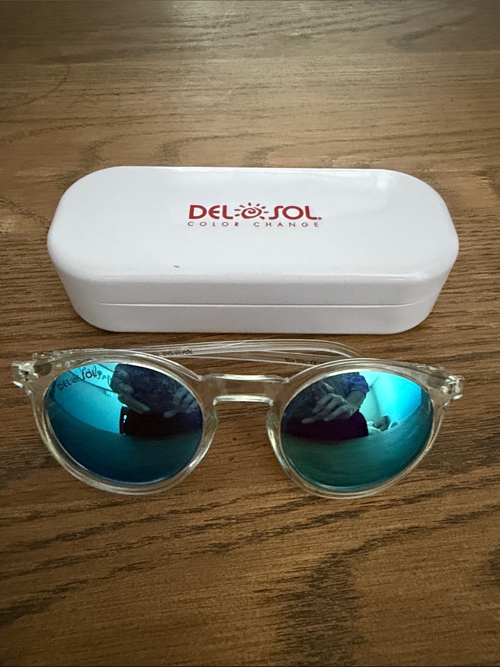 Del Sol Women’s Clear Frame Sunglasses with Blue Mirror Lenses